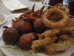 Hush puppies (left), sweet potato fries (center), onion rings (right)