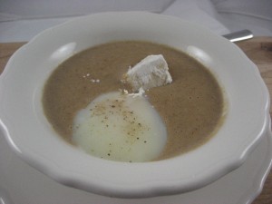 Bread soup with poached egg and gruyere marshmallow