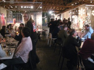 The dining room at Royal/T for LudoBites, with Krissy (center, standing)